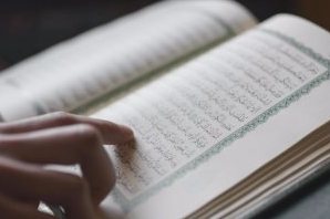 أمريكيان مسلم ومسيحى يترجمان القرآن لإبراز تشابه الديانتين