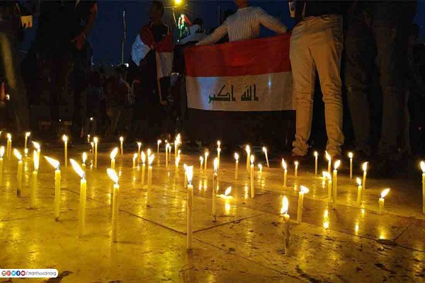 بالصور...محفل قرآني وسط جموع المتظاهرين في كربلاء