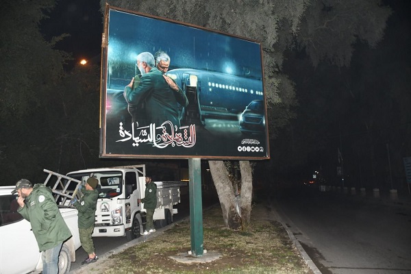 بالصور والفيديو...لافتات كبيرة لشهداء قادة النصر في شوارع العراق
