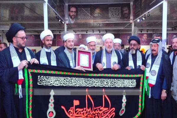 موكب فلسطيني في زيارة الاربعين تذكيراً بمظلومية الشعب الفلسطيني + فيديو موكب فلسطيني في زيارة الاربعين تذكيراً بمظلومية الشعب الفلسطيني + فيديو