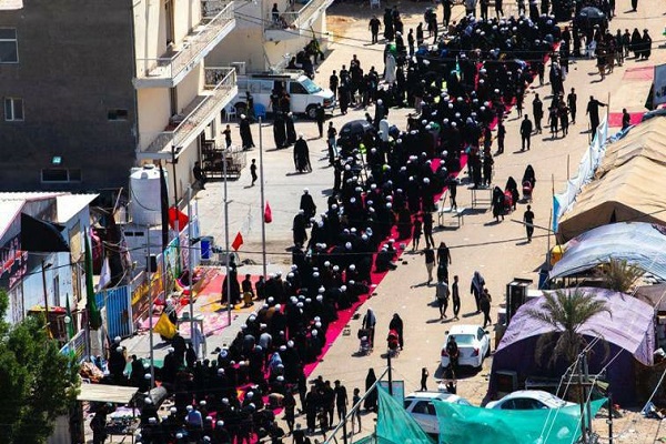 إقامةُ أطول صلاة جماعة موحّدة على طريق (يا حسين)