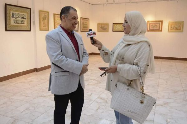 بالصور..حكاية دكتور عظام كتب القرآن بخط يده في 3 سنوات بمصر