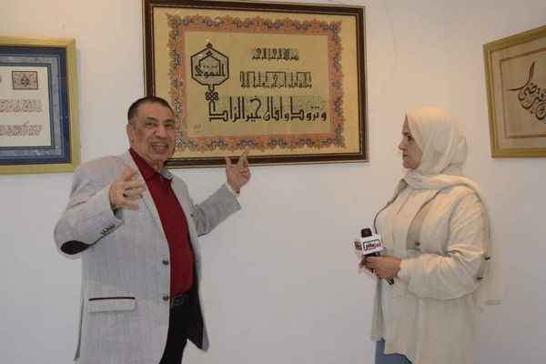 بالصور..حكاية دكتور عظام كتب القرآن بخط يده في 3 سنوات بمصر