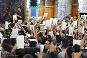 تقرير مصور | رفع القرآن تزامناً مع إستبدال راية قبة الإمام الحسين (ع)