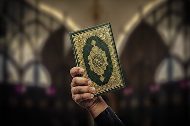 20 ألف نسخة من القرآن حاضرة خلال مسيرة عاشوراء وسط لندن 20 ألف نسخة من القرآن حاضرة خلال مسيرة عاشوراء وسط لندن