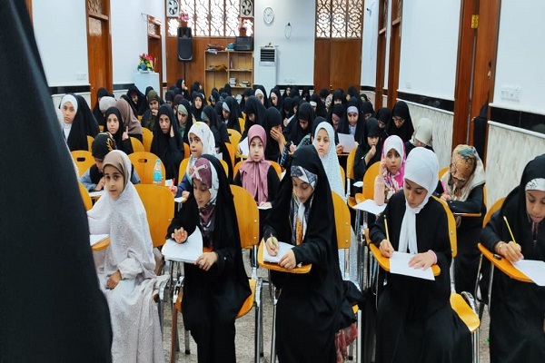 العراق: تنظيم دورة في تفسير القرآن بمشاركة 1000 طالب وطالبة + صور