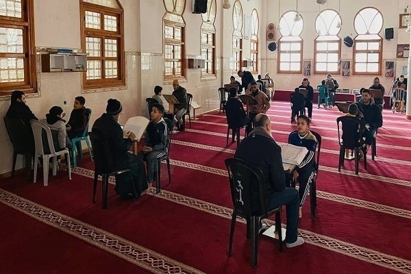 حفظ القرآن؛ مصدر الإيمان والأمل بين اللاجئين في غزة