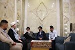 إهداء نسخة من موسوعة أهل البيت (ع) إلى معتمد السيد السيستاني في أوروبا