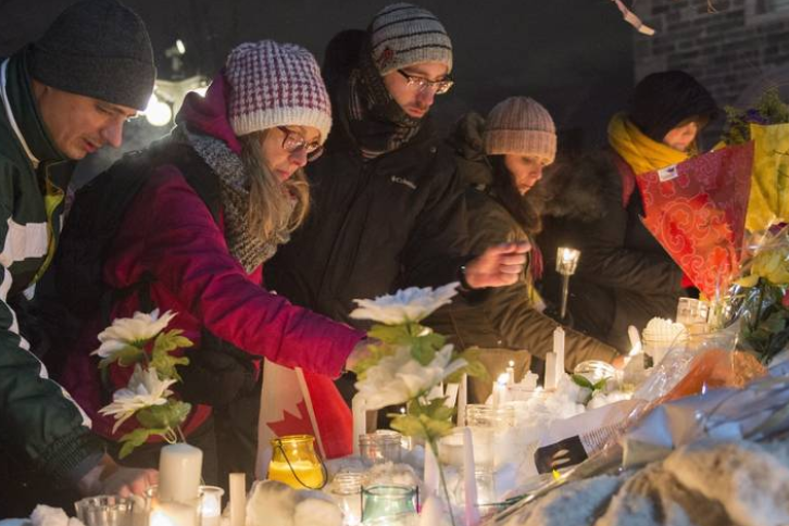 Thousands attend Quebec City vigil to mourn mosque attack victims