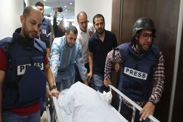 Colleagues taking Palestinian journalist Shireen Abu Akleh to hospital