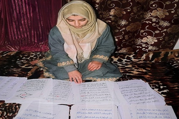 Muslim Girl in Kashmir Handwrites Quran in Six Months