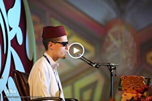 Algerian Visually-Impaired Qari Recites Verses from Surah Al-Furqan (+Video)