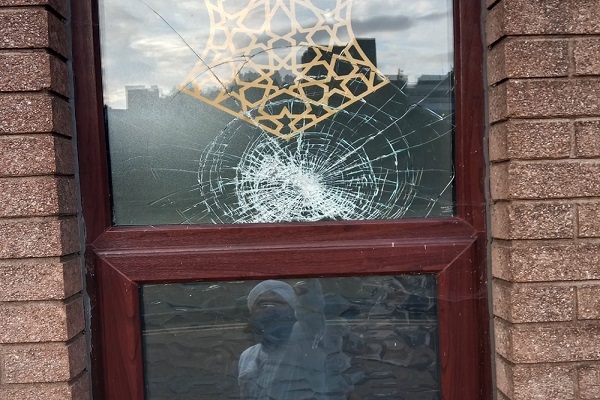 Man charged after an item was thrown at a mosque’s window in Wales.
