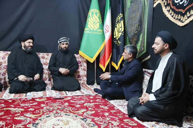Hojat-ol-Islam Seyed Mostafa Hosseini, secretary of Iran’s Council for Development of Quranic Culture (left)