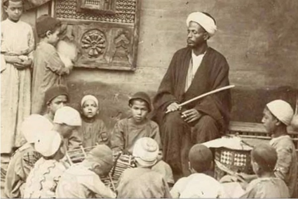 Students and their teacher at a Maktab (traditional Quran school)