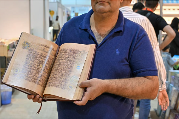 Millennium-Old Quran Manuscript Reborn at Int’l Book Fair Millennium-Old Quran Manuscript Reborn at Int’l Book Fair