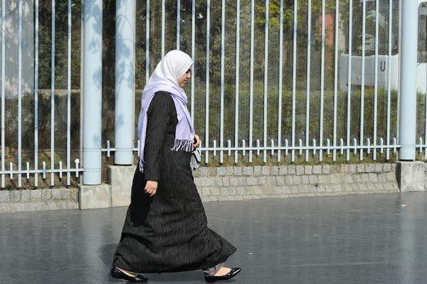 A Muslim woman wearing Hijab.