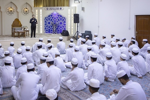 Teenagers taking part in the Amir Al-Qurra (king of Quran reciters) Quranic plan in Iraq