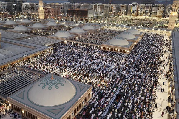Pilgrims and worshippers at the Prophet's Mosque in Medina