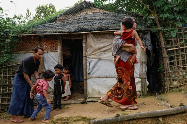 A family who fled from Buthidaung, Myanmar, at a refugee camp in Cox’s Bazar, Bangladesh, June 25, 2024.