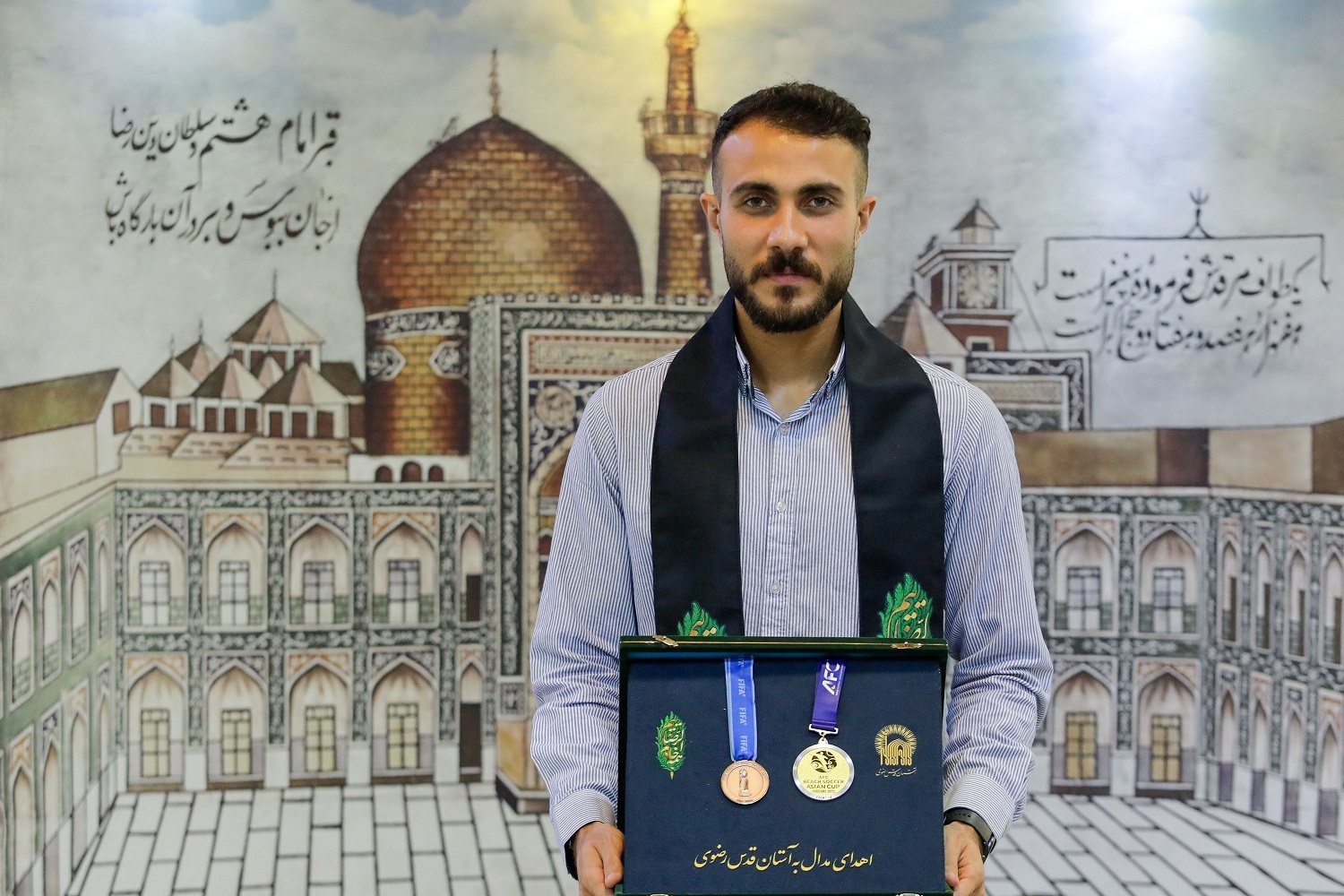 Iranian Beach Soccer Star Ali Mirshekari Donates Medals to Imam Reza Shrine Museum