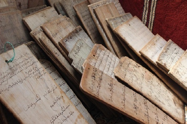 Notebooks used by Quran learners at a Maktab (traditional Quran school) in Morocco.