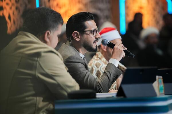 Woman Memorizing Quran at 71 A Guest of Al-Ameed Quran Competition in Karbala