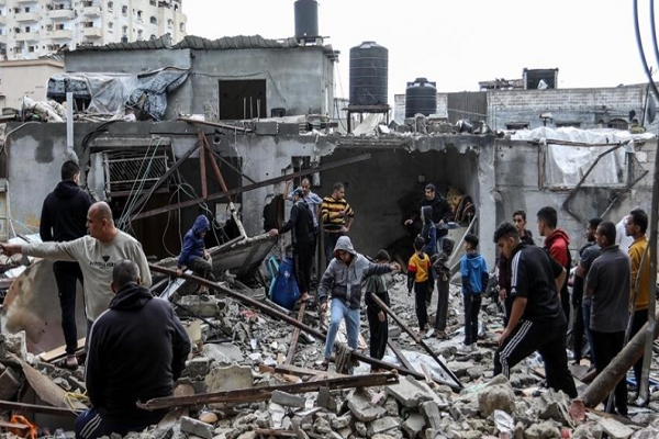 Three members of the same family were pulled from rubble in Gaza on Sunday, May 24, 2026, after Israeli fire struck their neighborhood, part of a wave of attacks that killed five Palestinians and wounded five others, medics said.