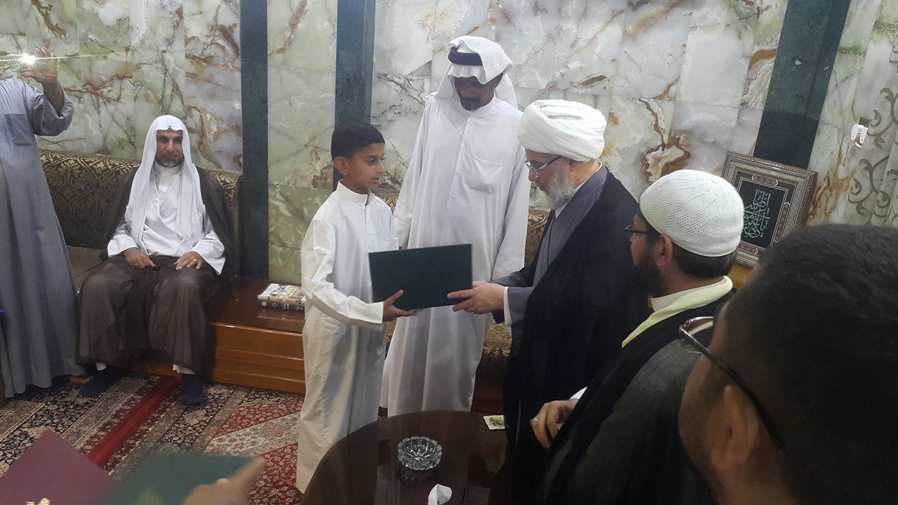 تجلیل از مسن‌ترین و خردسال‌ترین حافظ قرآن در کربلا + عکس