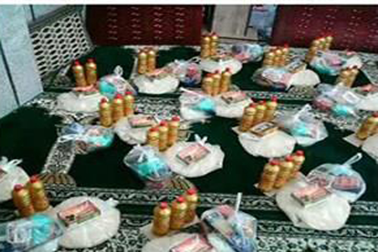 توزیع 100 بسته مواد غذایی بین نیازمندان بروجرد