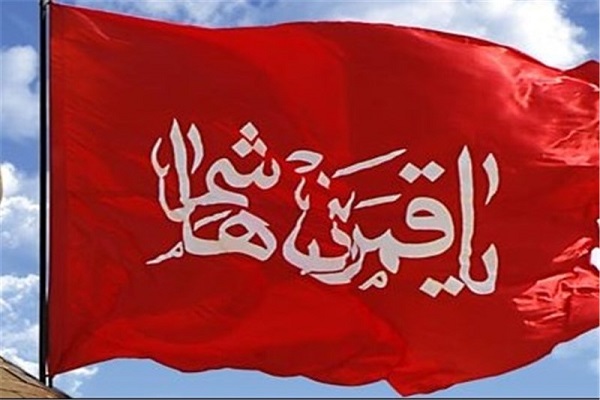 پرچم گردانی پرچم گنبد مطهر حضرت ابوالفضل (ع) در نمایشگاه قرآن