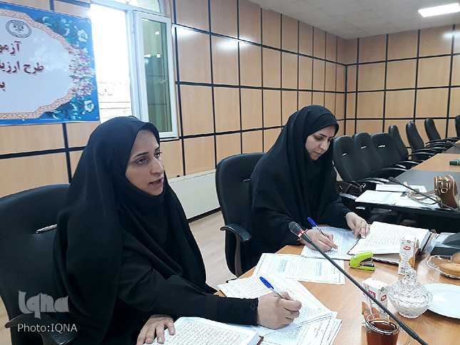 گزارش تصویری آزمون ارزیابی و اعطای مدرک به حافظان قرآن لرستان