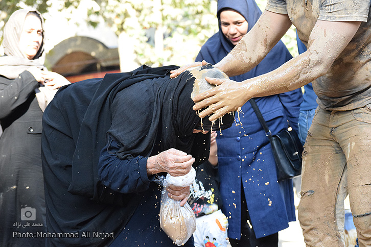 گزارش ایکنا از آیین چند هزار ساله &laquo;گِل مالی&raquo; + عکس