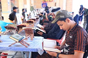 زیارت اربعین و تلاوت یک صفحه از قرآن + عکس