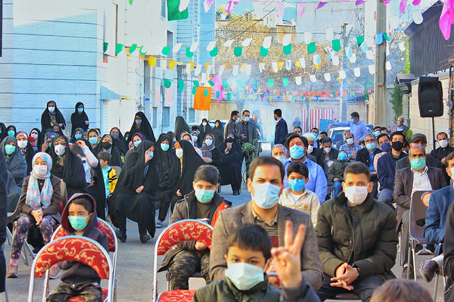 عکس | برگزاری جشن نیمه شعبان در کوچه&zwnj;ای با ۸ شهید در همدان
