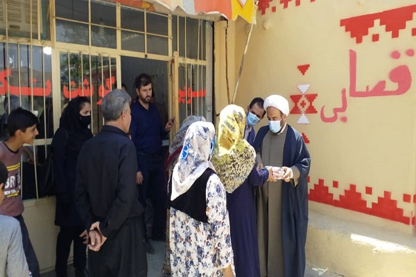 عکس | توزیع 1000 بسته گوشت قربانی از محل موقوفات کردستان