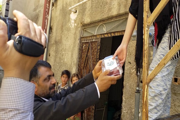 عکس | توزیع 1000 بسته گوشت قربانی از محل موقوفات کردستان