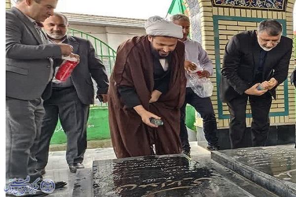 غبارروبی و عطرافشانی  گلزار شهدای مرزی کلا بابل کنار