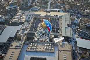 اهتزاز پرچم ولایت بر فراز حرم حضرت علی (ع) + عکس