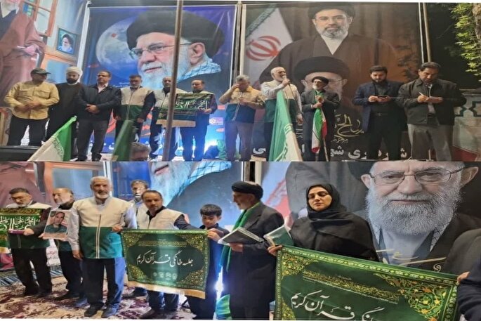 اهدای پرچم متبرک جلسات خانگی قرآن به خانواده‌های شهیدان موسوی و میرزاوند