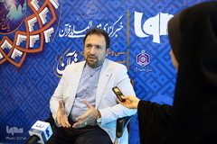 حضور قاری بین المللی محمدرضا پورزرگری در غرفه ایکنا