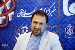 حضور قاری بین المللی محمدرضا پورزرگری در غرفه ایکنا