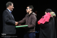 تجلیل از خانواده خبرنگار شهید مدافع حرم، محسن خزایی