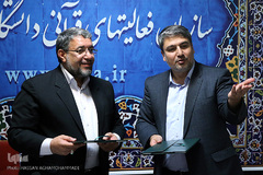  حمید صابر فرزام، رییس سازمان فعالیتهای قرآنی دانشگاهیان کشور و کریم نجفی برزگر، معاون فرهنگی دانشگاه پیام نور 