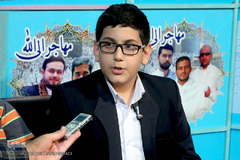 حضور حافظ قرآن نوجوان در غرفه ایکنا