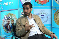 حضور هادی موحد امین، قاری بین‌المللی قرآن کریم در غرفه ایکنا