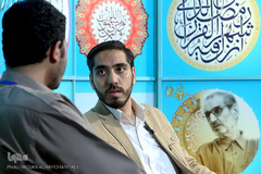 حضور هادی موحد امین، قاری بین‌المللی قرآن کریم در غرفه ایکنا