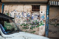 چسباندن غیر مجاز پوسترهای انتخاباتی بر روی دیوارهای معابر شهر تهران