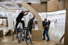 آماده سازی غرفه ایکنا در بیست و سومین نمایشگاه مطبوعات