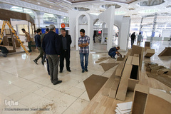 آماده سازی غرفه ایکنا در بیست و سومین نمایشگاه مطبوعات